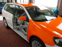 Vollverklebung von weiß zu orange